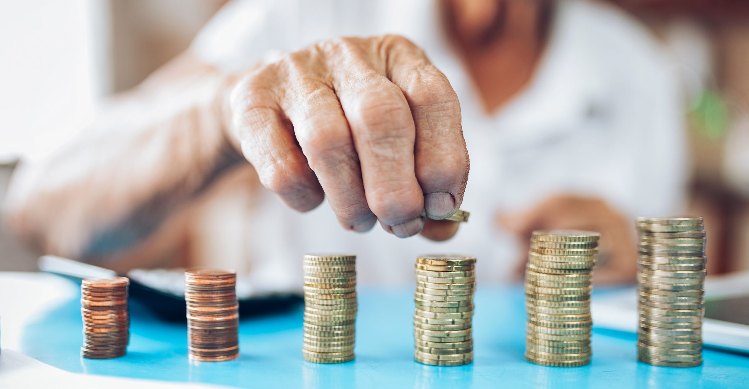 Senior woman at home checking her finances and investments